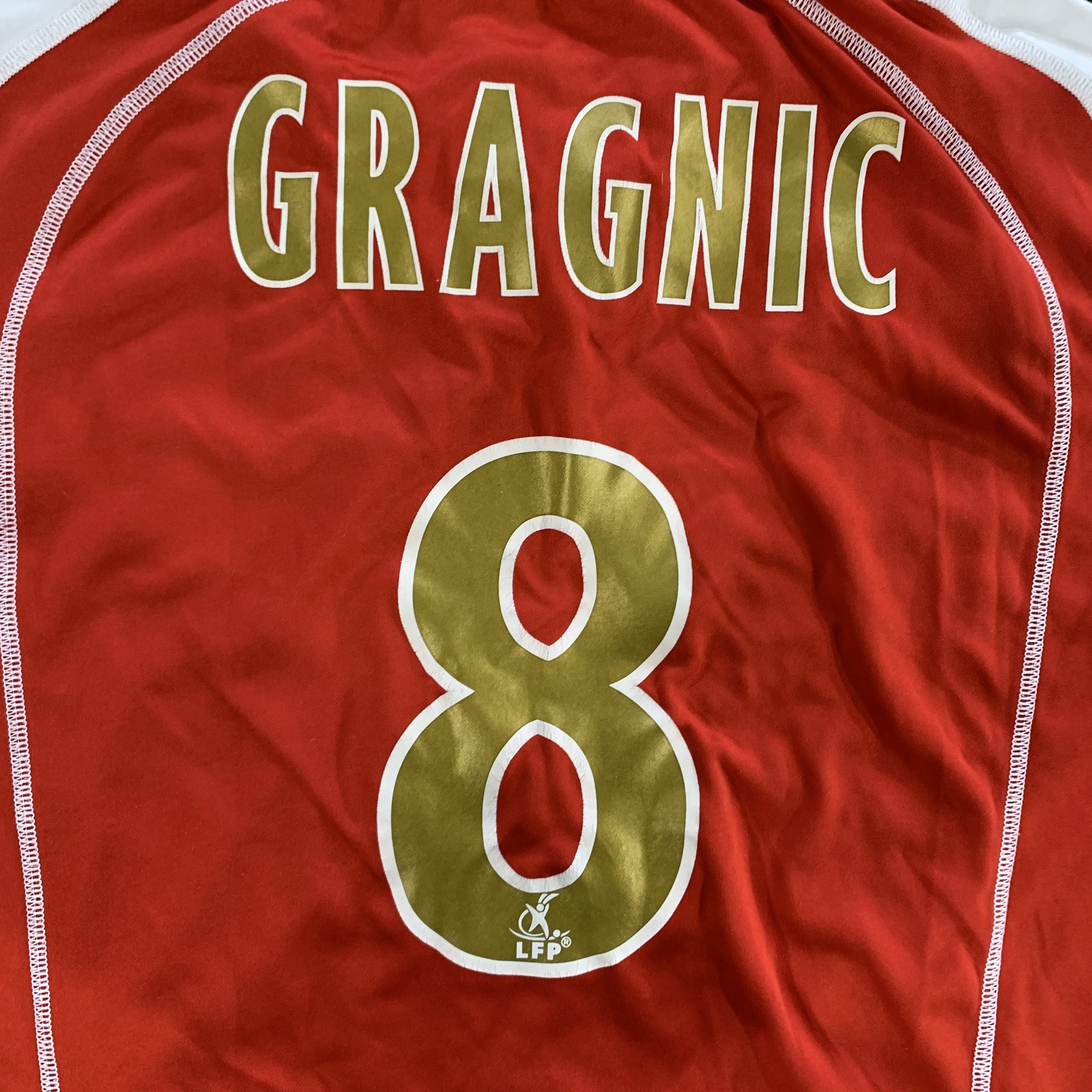 Détail flocage maillot domicile stade de reims gragnic vintage saison 2007-2008 arcelormittal lotto